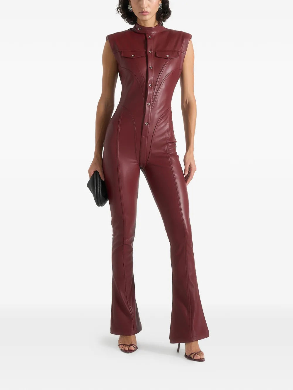 Aurelia Luxe women's deep burgundy maroon genuine lambskin leather jumpsuit featuring a high mandarin stand collar, cap shoulders, full-length front snap button placket, dual chest flap pockets, waist-contouring vertical seams, flared bootcut legs, and custom made-to-measure fitting across the UK, USA, and Australia.side