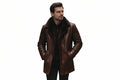 Men's blazer loom outback style genuine soft lambskin real leather long coat in dark mahogany espresso brown featuring plush dark brown fur-lined notch lapels, single-breasted button front closure, side handwarmer pockets, long fitted sleeves, mid-thigh length cut, and custom made-to-measure fitting across the UK, USA, and Australia.
