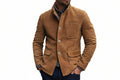 Men's burnout forge crown line genuine real soft suede leather blazer jacket in tobacco camel featuring a high stand-up collar, single-breasted front button closure with engraved contrast buttons, patch chest pocket, dual lower rounded flap waist pockets, tailored slim fit silhouette, and custom made-to-measure tailoring across the UK, USA, and Australia.
