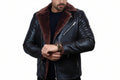 Chrome Craft men's black lambskin leather motorcycle jacket featuring an asymmetric diagonal zip closure, brown shearling fur lapel lining, chrome zipper hardware, zip cuffs, and custom made-to-measure fitting across the UK, USA, and Australia.