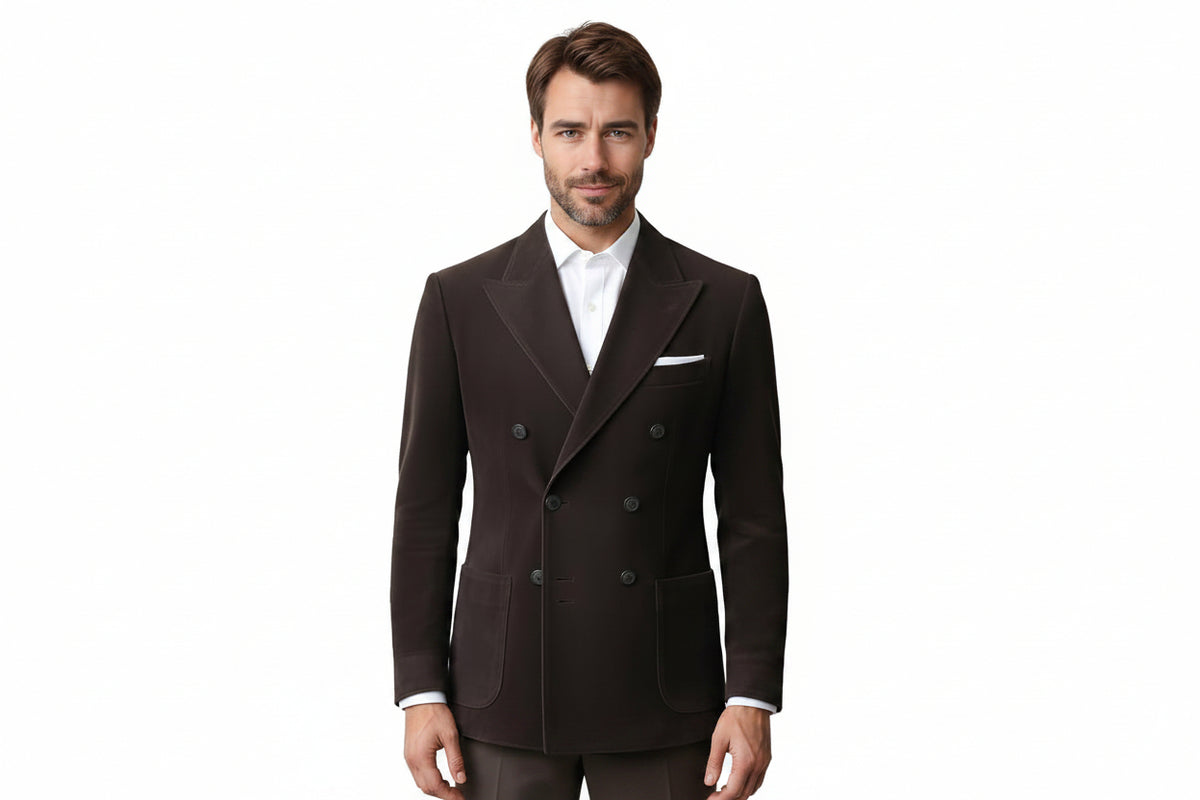 Men's classic mantle classic fit genuine real soft suede leather office blazer suit jacket in dark chocolate brown featuring broad sartorial peak lapels, double-breasted six-button front closure, upper welt chest pocket with white pocket square, dual lower patch waist pockets, tailored structure, and custom made-to-measure tailoring across the UK, USA, and Australia.