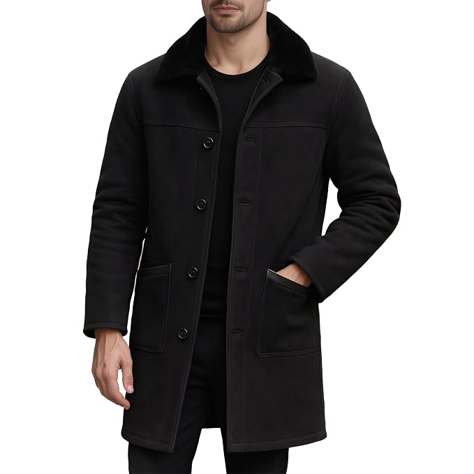 Men's crown edge elegant genuine soft suede real leather long coat in jet black featuring a plush tonal black fur fold-over collar, single-breasted button front closure, large hip patch pockets, long fitted sleeves, knee-length cut, and custom made-to-measure fitting across the UK, USA, and Australia.side