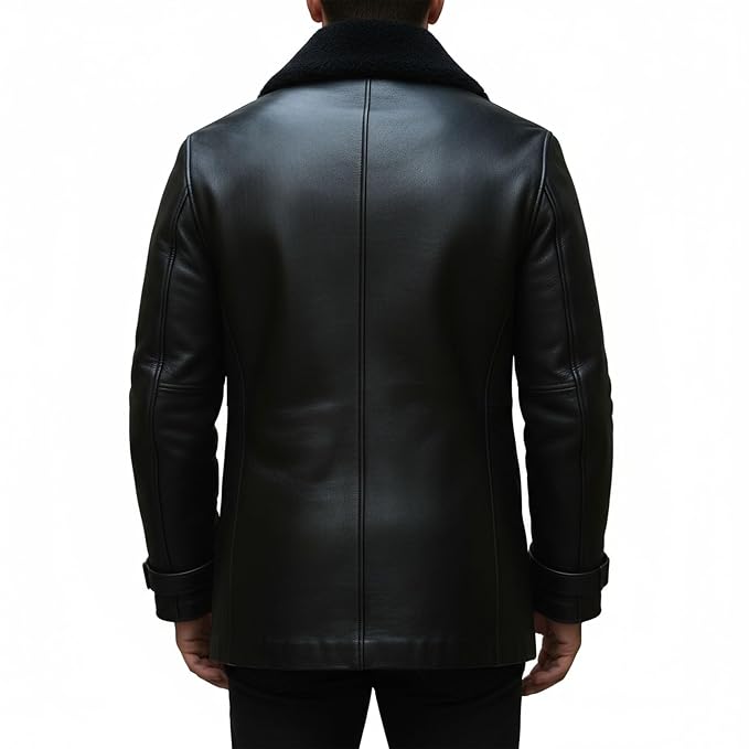 Men's crown mantle western cowboy genuine soft lambskin real leather long duster coat in jet black featuring a plush tonal black shearling fleece collar and wide notch lapels, single-breasted button front closure, angled side handwarmer welt pockets, buckled sleeve cuffs, long fitted sleeves, mid-to-longline duster cut, and custom made-to-measure fitting across the UK, USA, and Australia.back