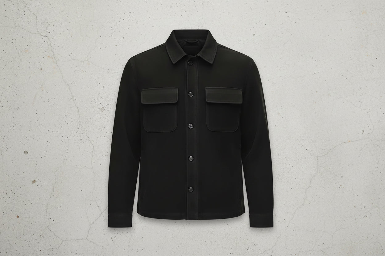 Crown Pelt men's jet black genuine suede leather jacket featuring a spread shirt collar, dual chest flap pockets, button-front closure, and custom made-to-measure fitting across the UK, USA, and Australia.