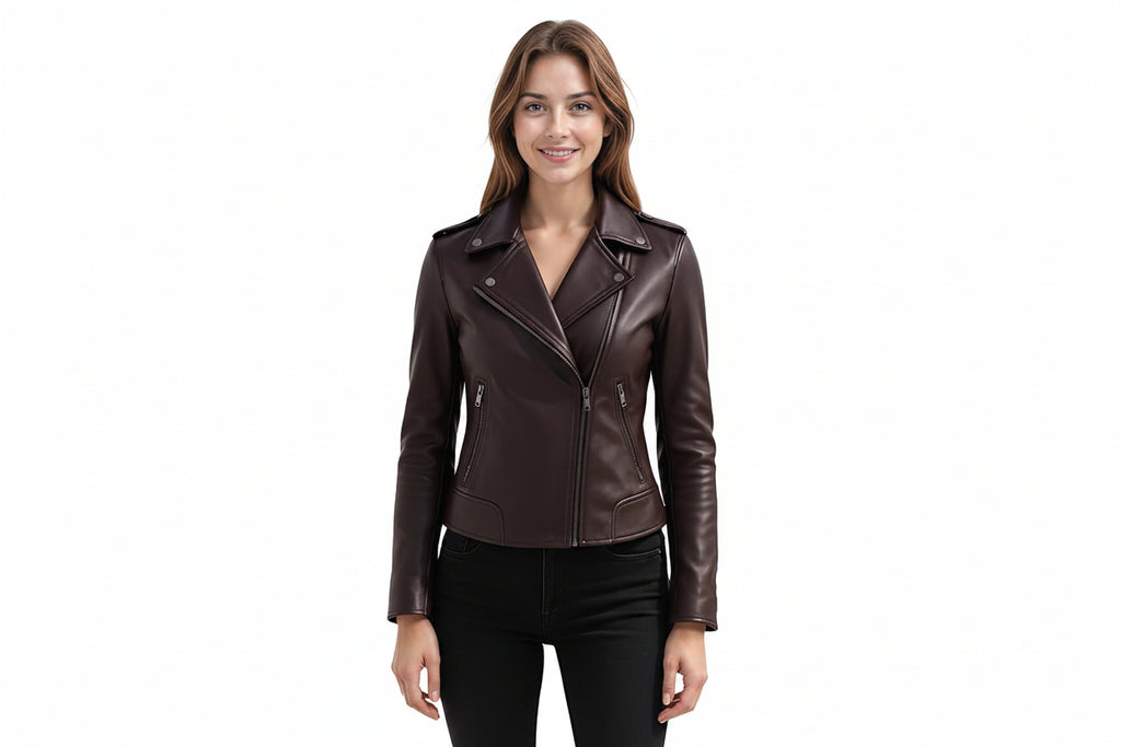A woman modeling a dark brown faux leather moto jacket with an asymmetrical zipper, set against a plain white background.