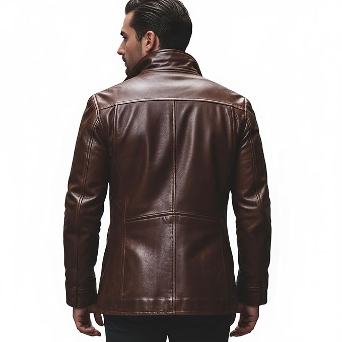 Men's elite mantle explorer genuine soft lambskin real leather long coat in cognac chestnut brown featuring a high standing convertible neck collar, tailored notch lapels, single-breasted button front closure, deep angled side slash pockets, long fitted sleeves, longline explorer cut, and custom made-to-measure fitting across the UK, USA, and Australia.back