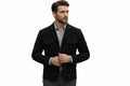 Men's elite stitch premium genuine real soft suede leather casual blazer jacket in midnight black featuring sharp notch lapels, single-breasted front button closure, four-pocket utility design with dual chest flap pockets and dual waist flap pockets, tailored slim fit, and custom made-to-measure tailoring across the UK, USA, and Australia.