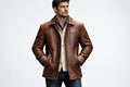 Front view of a man wearing the distressed brown Ghost Trail Royal Mode Real Leather Jacket featuring a shirt collar and button closure.