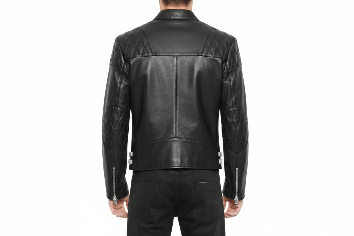 Men's Heritage 1928 genuine real soft lambskin leather rider jacket in dark brown featuring high-contrast off-white cream snap lapels, asymmetrical off-center front zipper closure, diamond-quilted shoulder panels, vertical zip chest pocket, zip waist pockets, dual silver side-waist buckle straps, tailored slim fit, and custom made-to-measure tailoring available worldwide.back
