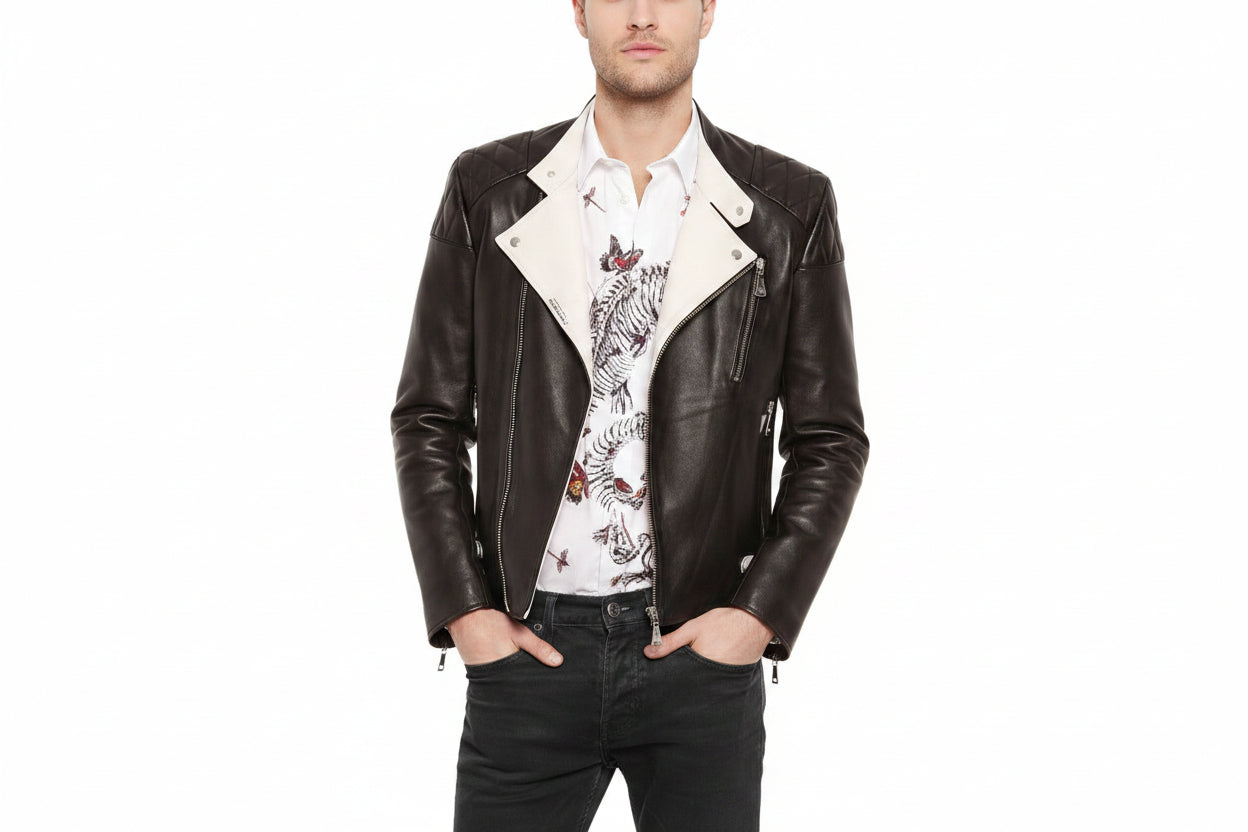 Men's Heritage 1928 genuine real soft lambskin leather rider jacket in dark brown featuring high-contrast off-white cream snap lapels, asymmetrical off-center front zipper closure, diamond-quilted shoulder panels, vertical zip chest pocket, zip waist pockets, dual silver side-waist buckle straps, tailored slim fit, and custom made-to-measure tailoring available worldwide.