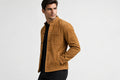 Side view of the tan brown Imperial Craft Slim Biker Suede Leather Jacket featuring a stand collar, button closure, and chest pocket.