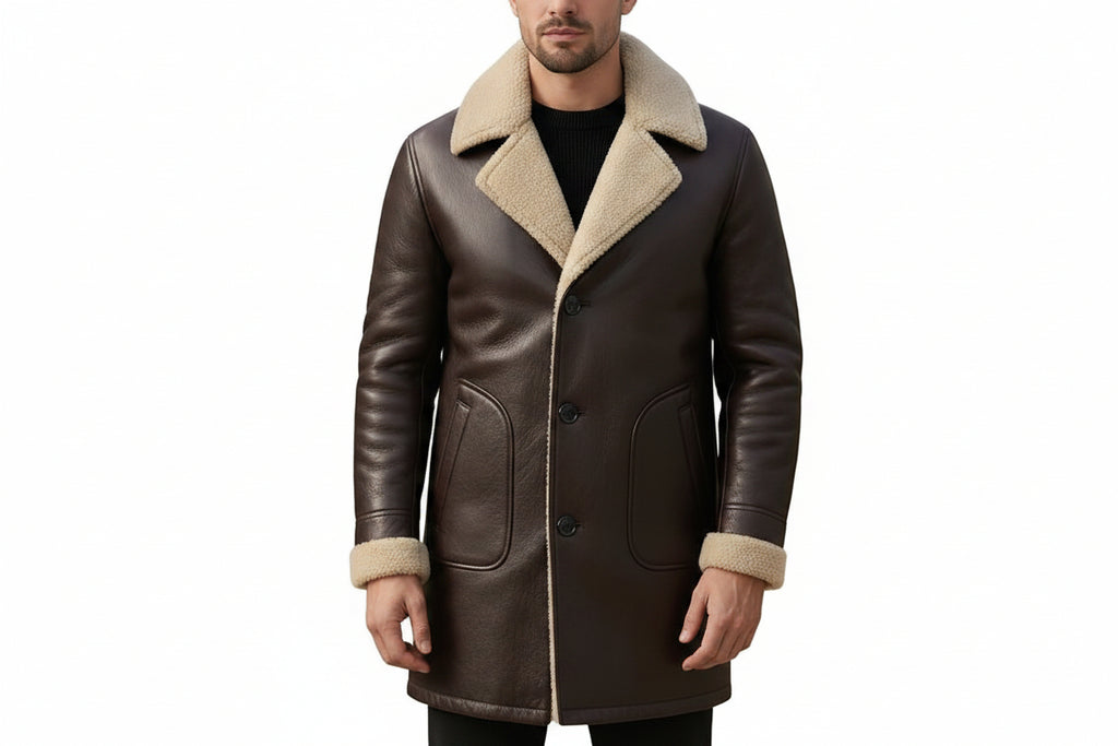 Men's leather court elegant formal wear genuine soft lambskin real leather 3/4 length coat in polished jet black featuring a plush wide cream shearling fleece collar and notch lapels, matching shearling-trimmed turn-back cuffs, single-breasted button front closure, rounded front patch handwarmer pockets, long fitted sleeves, mid-thigh length cut, and custom made-to-measure fitting across the UK, USA, and Australia.