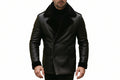Men's legacy grain modern trench genuine soft lambskin real leather 3/4 length coat in matte jet black featuring a plush wide black shearling fleece collar and notch lapels, matching shearling-trimmed turn-back cuffs, double-breasted front button closure, structured front flap waist pockets, long fitted sleeves, mid-thigh length cut, and custom made-to-measure fitting across the UK, USA, and Australia.