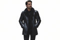 Men's luxe monarch black distressed genuine soft lambskin real leather 3/4 length coat featuring a plush wide black shearling fleece collar and notch lapels, single-breasted button front closure, angled side handwarmer welt pockets, long fitted sleeves, mid-thigh length cut, and custom made-to-measure fitting across the UK, USA, and Australia.