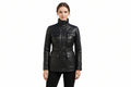 Noirgrain women's jet black genuine lambskin real leather jacket featuring a high stand collar, diamond-quilted chest yokes, matching grommeted waist belt, four snap-flap pockets, snap-buckle cuffs, and custom made-to-measure fitting across the UK, USA, and Australia.