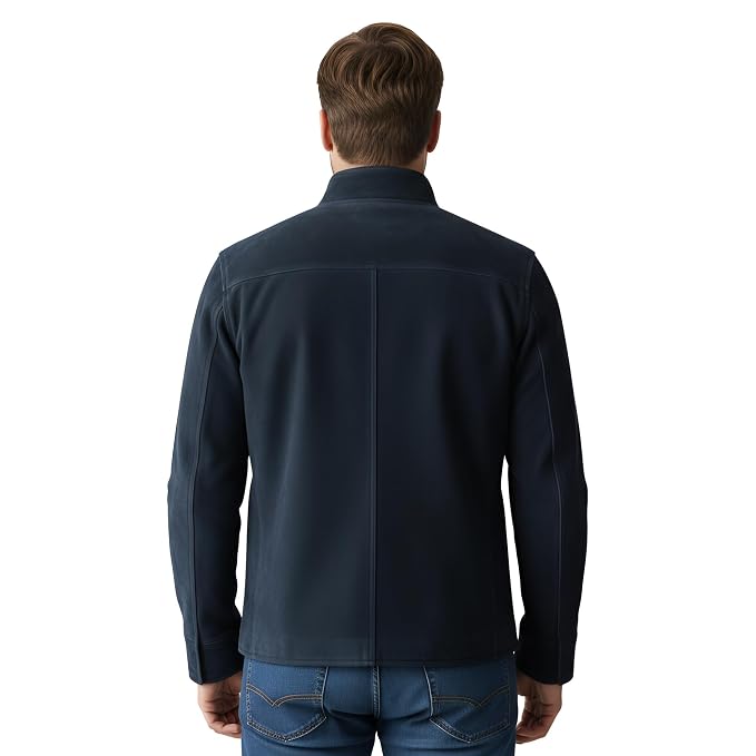 Back view of a man wearing the navy blue Obsidian Stitch Supreme Heritage Suede Jackets featuring a stand collar, button closure, and utility pockets.