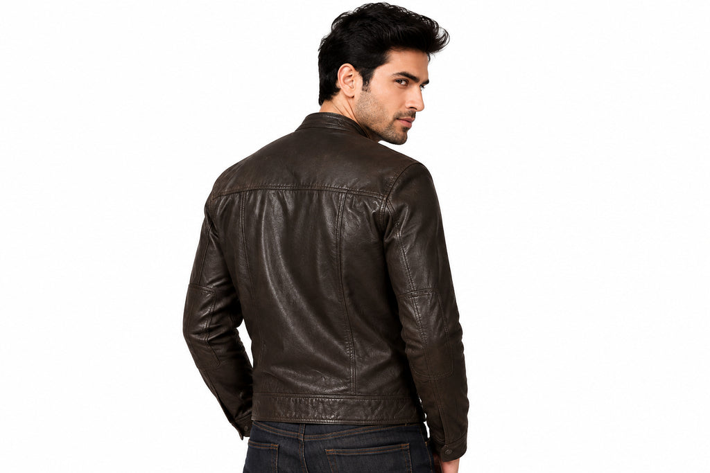 Back view of a man wearing the dark brown Prime Lambskin Cafe Racer leather Jacket featuring a snap-tab collar and front zip closure.