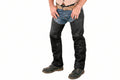 Men's raven edge premium genuine soft lambskin real leather motorcycle riding chaps in matte black featuring full-length outer side leg zippers, bottom ankle snap-button closures, articulated knee seam paneling, low-slung open crotch over-jeans design, and custom made-to-measure fitting across the UK, USA, and Australia.