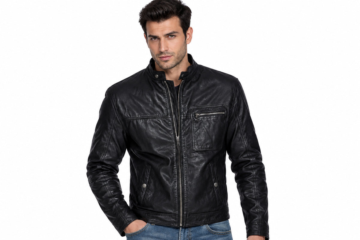 Front view of a man wearing the black Runway Asymmetrical Leather Biker Jacket featuring a snap-tab collar and offset zipper.
