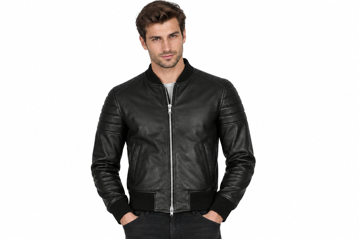 Front view of a man wearing the smoked tobacco leather jacket featuring a ribbed knit collar, full-zip front, and quilted shoulders.