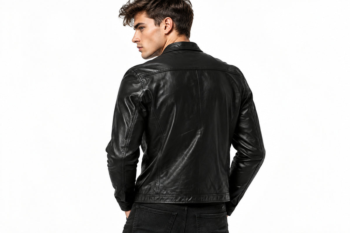 Back view of a man wearing the black The Ace Cafe Slim-Fit Leather Jacket featuring a snap-tab collar and full-zip front closure.