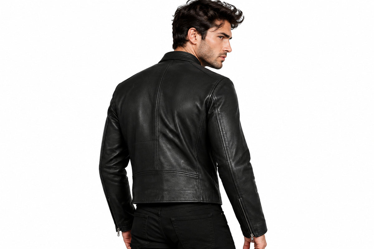 Back view of a man wearing the black The Antique Hide Biker Jacket featuring a ribbed collar and full-zip front closure.