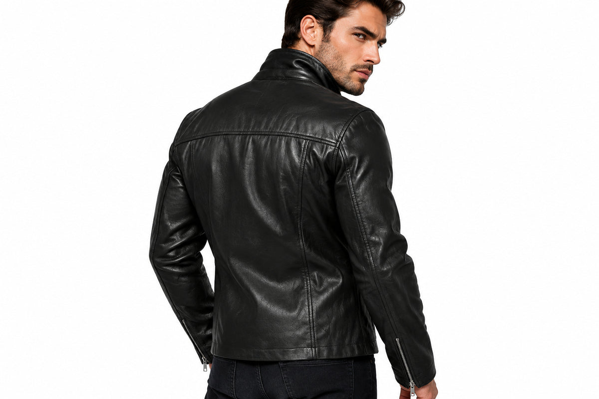 Back view of a man wearing the black The Axis Modern Leather Biker Jacket featuring a notched lapel collar and offset front zipper.