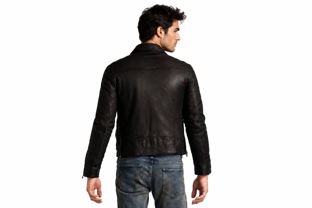 Back view of a man wearing the dark brown The Badlands Heavy Biker Jacket featuring a shirt-style collar and dual flap pockets.