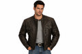 Front view of a man wearing the black The Bespoke Atelier Biker Jacket featuring a snap-tab collar and multi-zip layout.