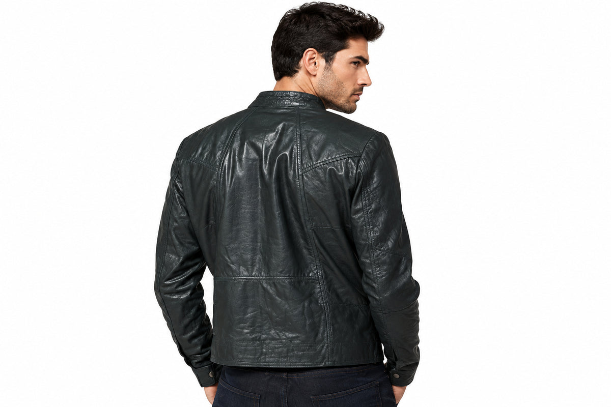 Back view of a man wearing the charcoal black The Cyber-Rider Biker Jacket featuring a snap-tab collar and full-zip closure