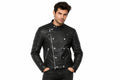 Front view of a man wearing the black The Gridline Minimal Biker jacket featuring a snap-tab collar and asymmetrical double-breasted zip layout.