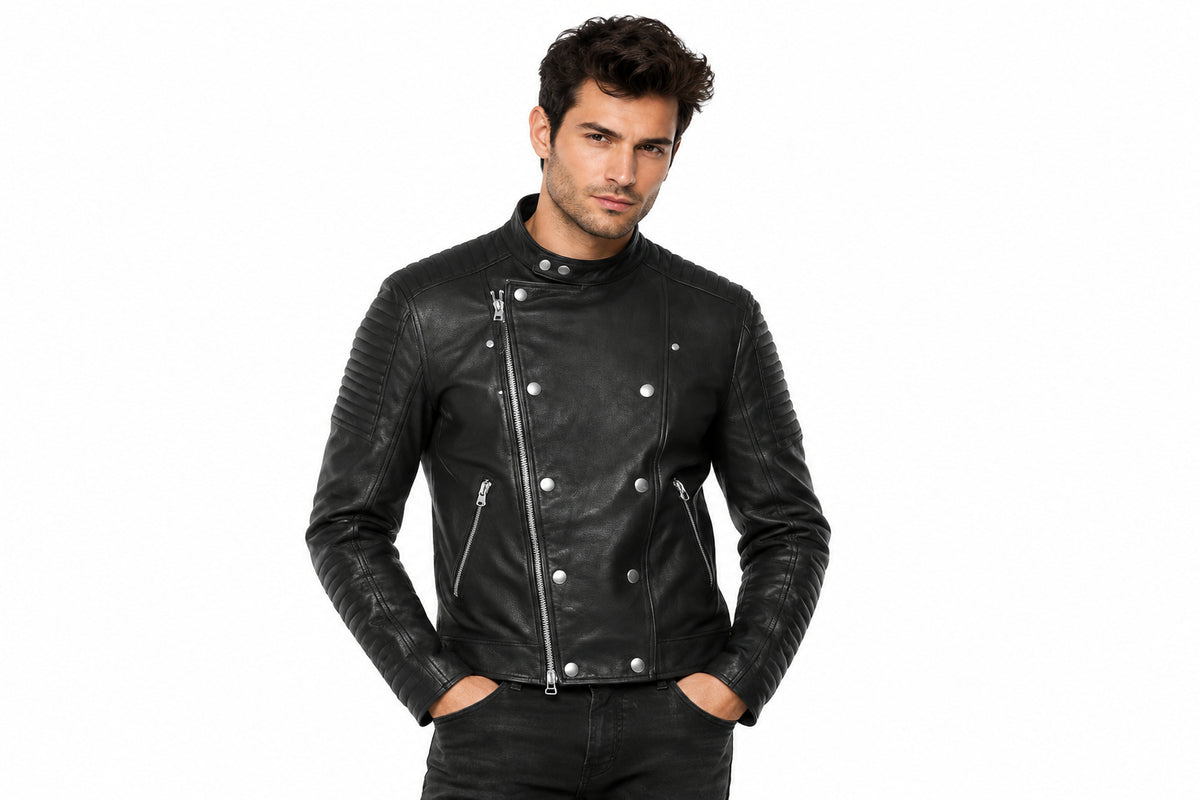 Front view of a man wearing the black The Gridline Minimal Biker jacket featuring a snap-tab collar and asymmetrical double-breasted zip layout.