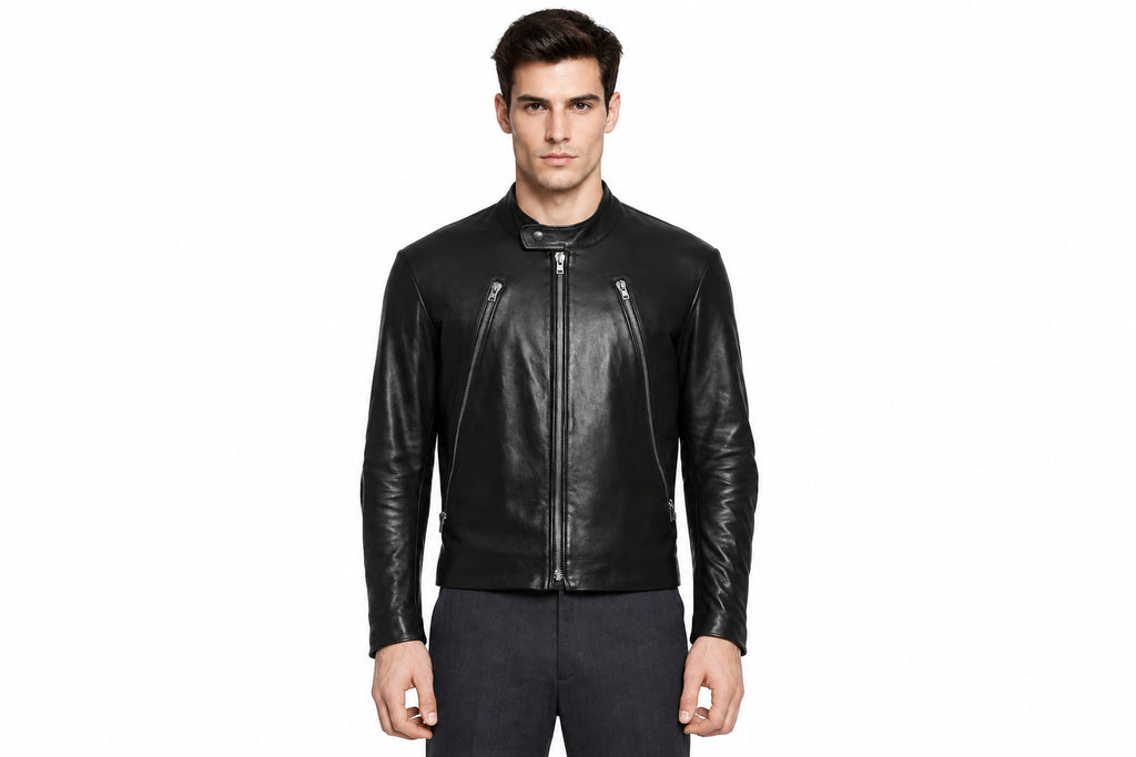 Front view of a man wearing the black The Rebel Moto Icon Leather Jacket featuring a stand collar and vertical zippered chest pockets.