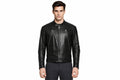 Front view of a man wearing the black The Rebel Moto Icon Leather Jacket featuring a stand collar and vertical zippered chest pockets.
