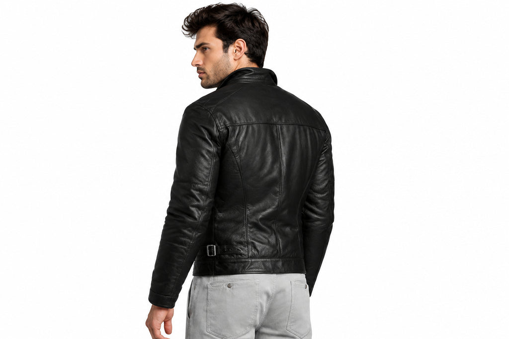 Back view of a man wearing the black The Rust Belt Asymmetrical Jacket featuring a fold-down collar and chest flap pockets.