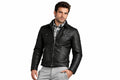 Front view of a man wearing the black The Rust Belt Asymmetrical Jacket featuring a fold-down collar and chest flap pockets.