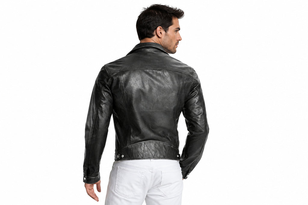 Back view of a man wearing the vintage black The Rustic Outpost Leather Jacket featuring notched lapels and an asymmetrical zipper.