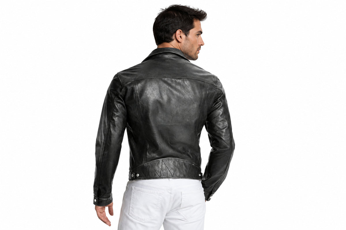 Back view of a man wearing the vintage black The Rustic Outpost Leather Jacket featuring notched lapels and an asymmetrical zipper.