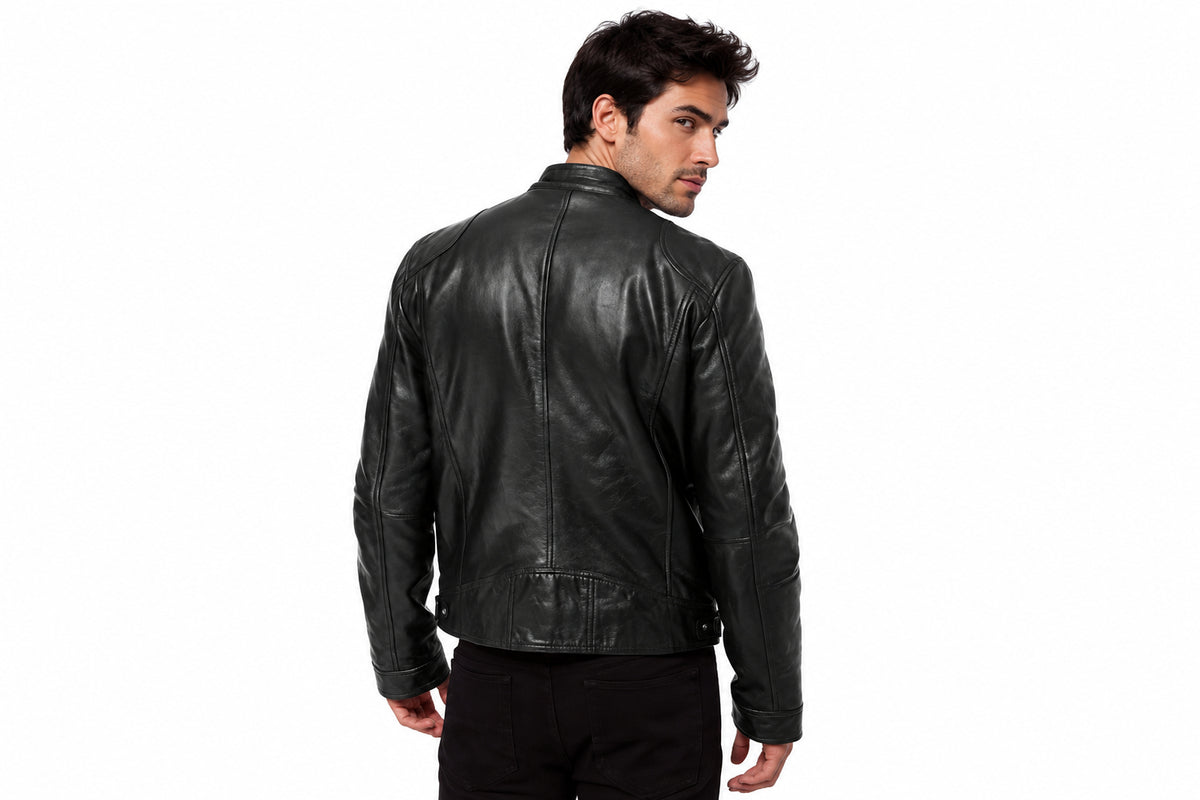 Back view of a man wearing the black The Speedster Cafe Racer Jacket featuring a stand collar and zippered chest pockets.