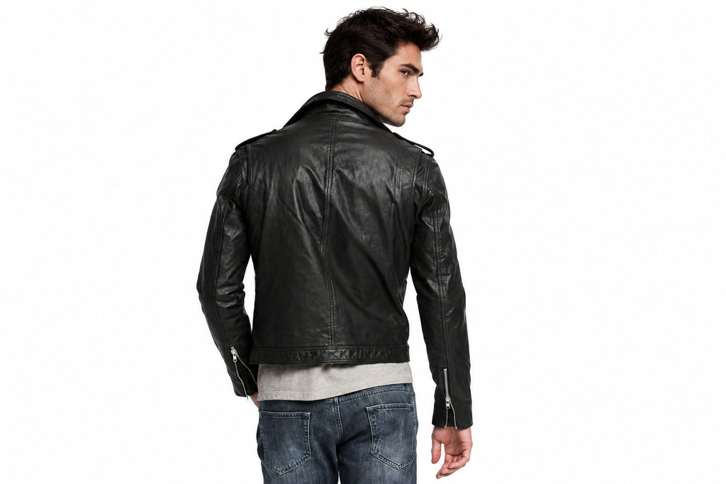 Back view of a man wearing the black The Strider Leather Racer Jacket featuring notched lapels and an asymmetrical zipper.