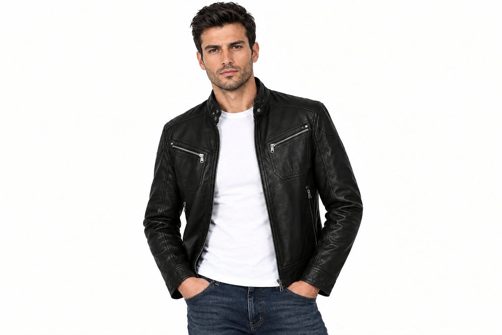Front view of a man wearing the black The Tailored Outlaw Moto Jacket featuring a stand collar and dual chest zip pockets.