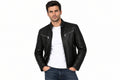 Front view of a man wearing the black The Tailored Outlaw Moto Jacket featuring a stand collar and dual chest zip pockets.
