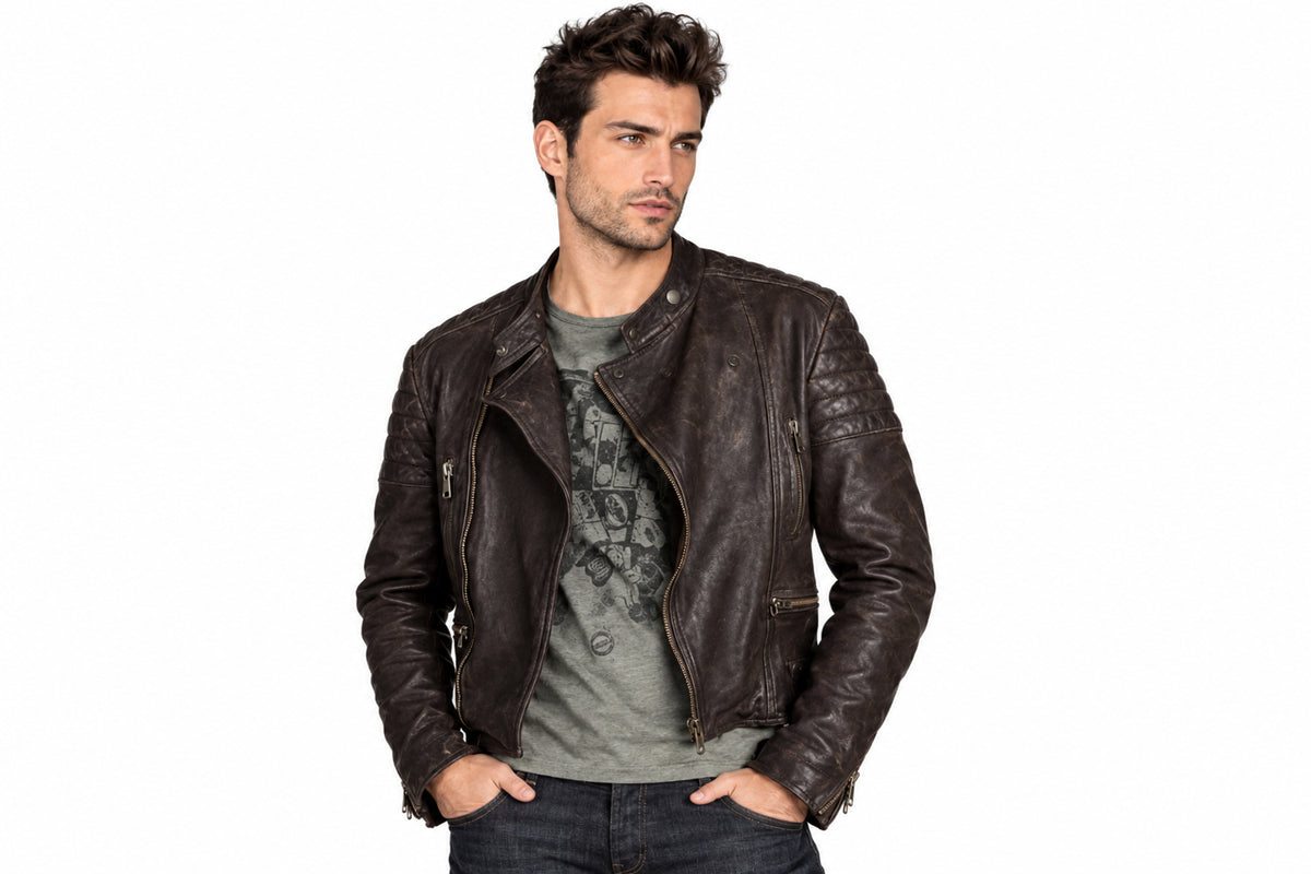 Front view of a man wearing the brown The Vanguard Modern Moto Jacket featuring a stand collar and asymmetrical zipper.