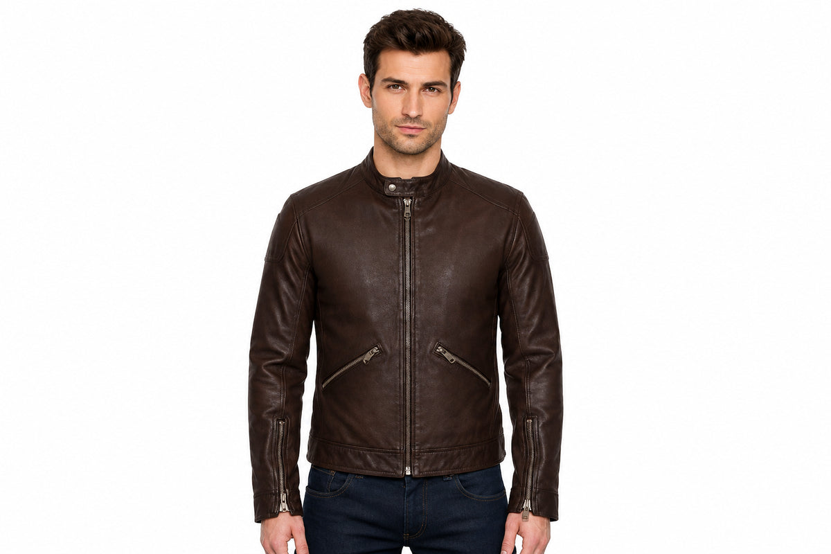 Front view of a man wearing the chocolate brown The Velocity Leather Jacket featuring a stand collar and zippered pockets.