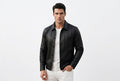 Front view of a man wearing the black Thunder Rider Highline Mens Lambskin Leather Fashion Jacket featuring a single patch chest pocket and a shirt collar.