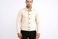 Front view of a man wearing the off-white Titan Pelt Vintage Lambskin Mens Moto Leather Jacket featuring angled slanted pockets and antique brass buttons.