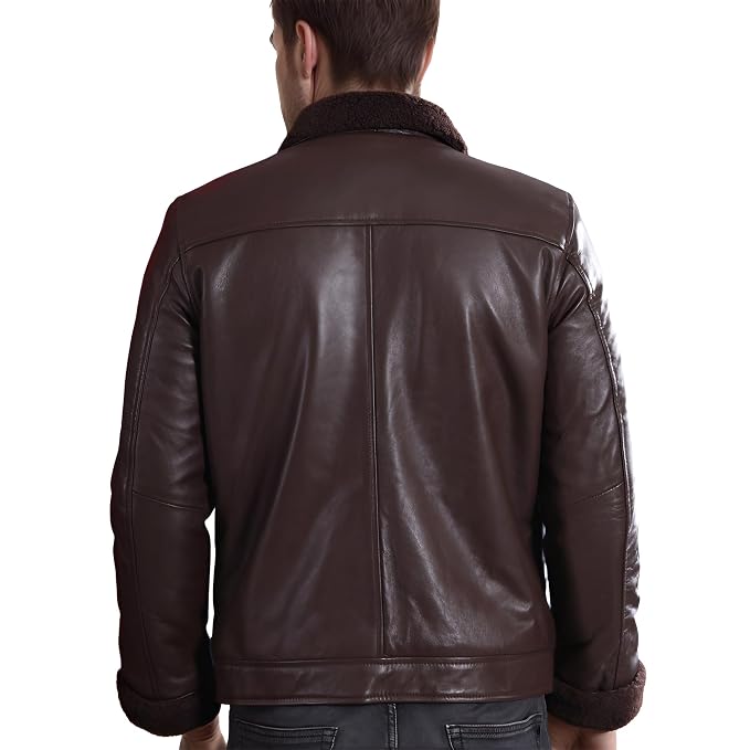 Back view of a man wearing the dark brown Urban Gear Heritage Genuine Biker Leather Jacket featuring a shearling-lined collar and turn-back cuffs.
