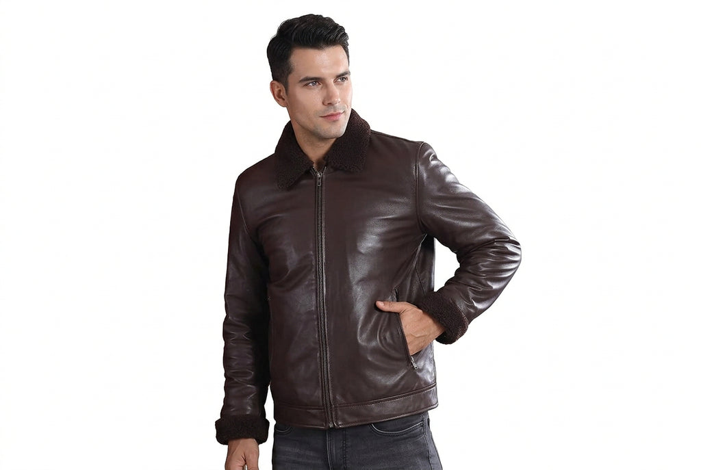 Front view of a man wearing the dark brown Urban Gear Heritage Genuine Biker Leather Jacket featuring a shearling-lined collar and turn-back cuffs.