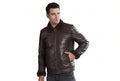 Front view of a man wearing the dark brown Urban Gear Heritage Genuine Biker Leather Jacket featuring a shearling-lined collar and turn-back cuffs.