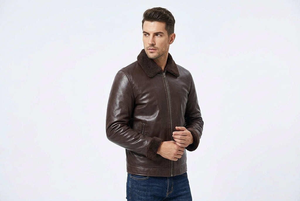 Side view of a man wearing the dark brown Urban Gear Heritage Genuine Biker Leather Jacket featuring a shearling-lined collar and turn-back cuffs.
